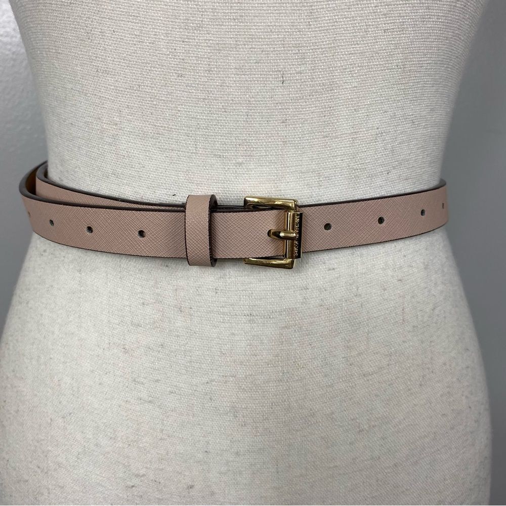 Michael Kors slim pink leather belt with a gold-tone pin buckle.